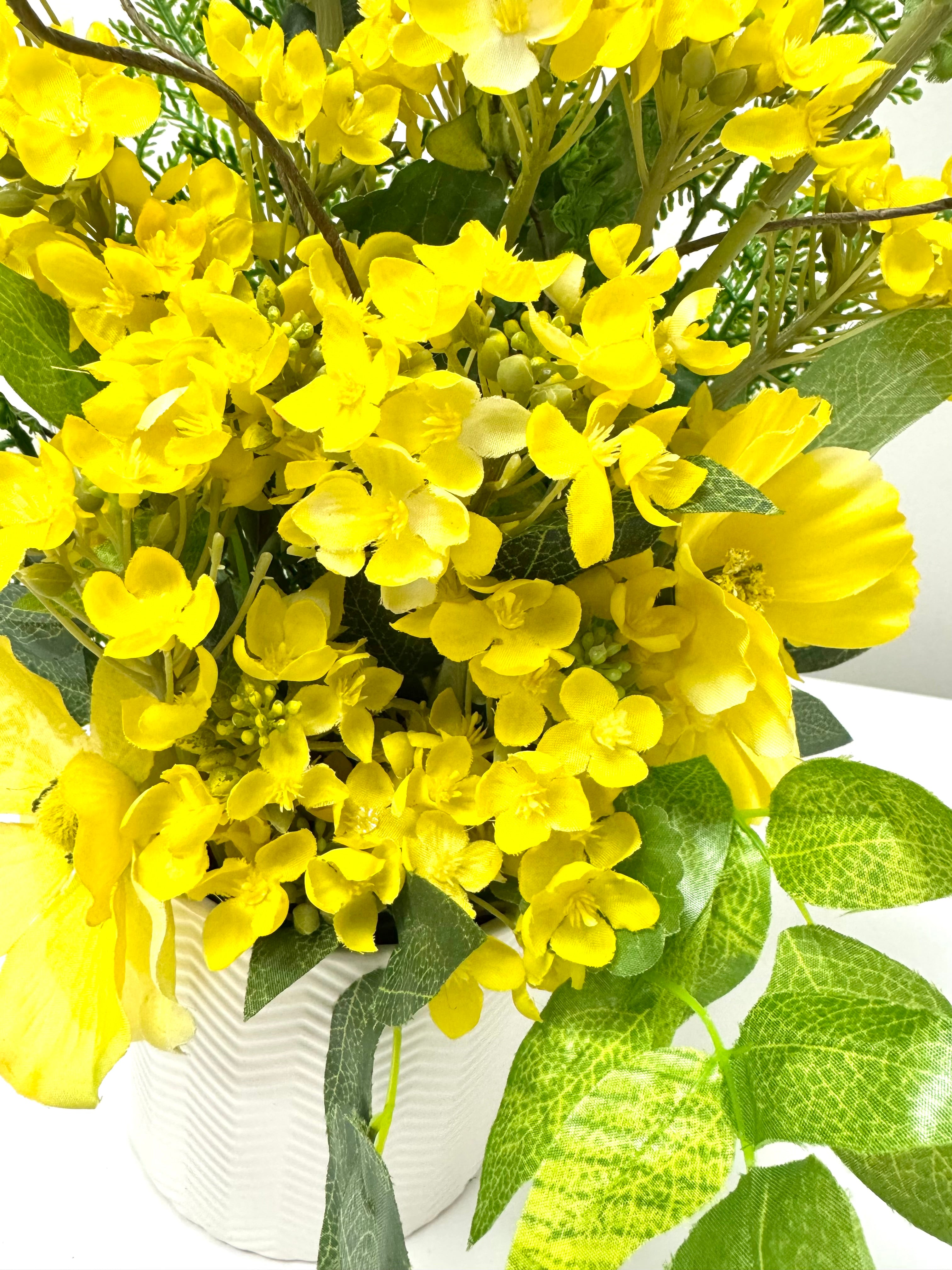 Yellow Alyssum Floral Bouquet in White Zig Zag Pot
