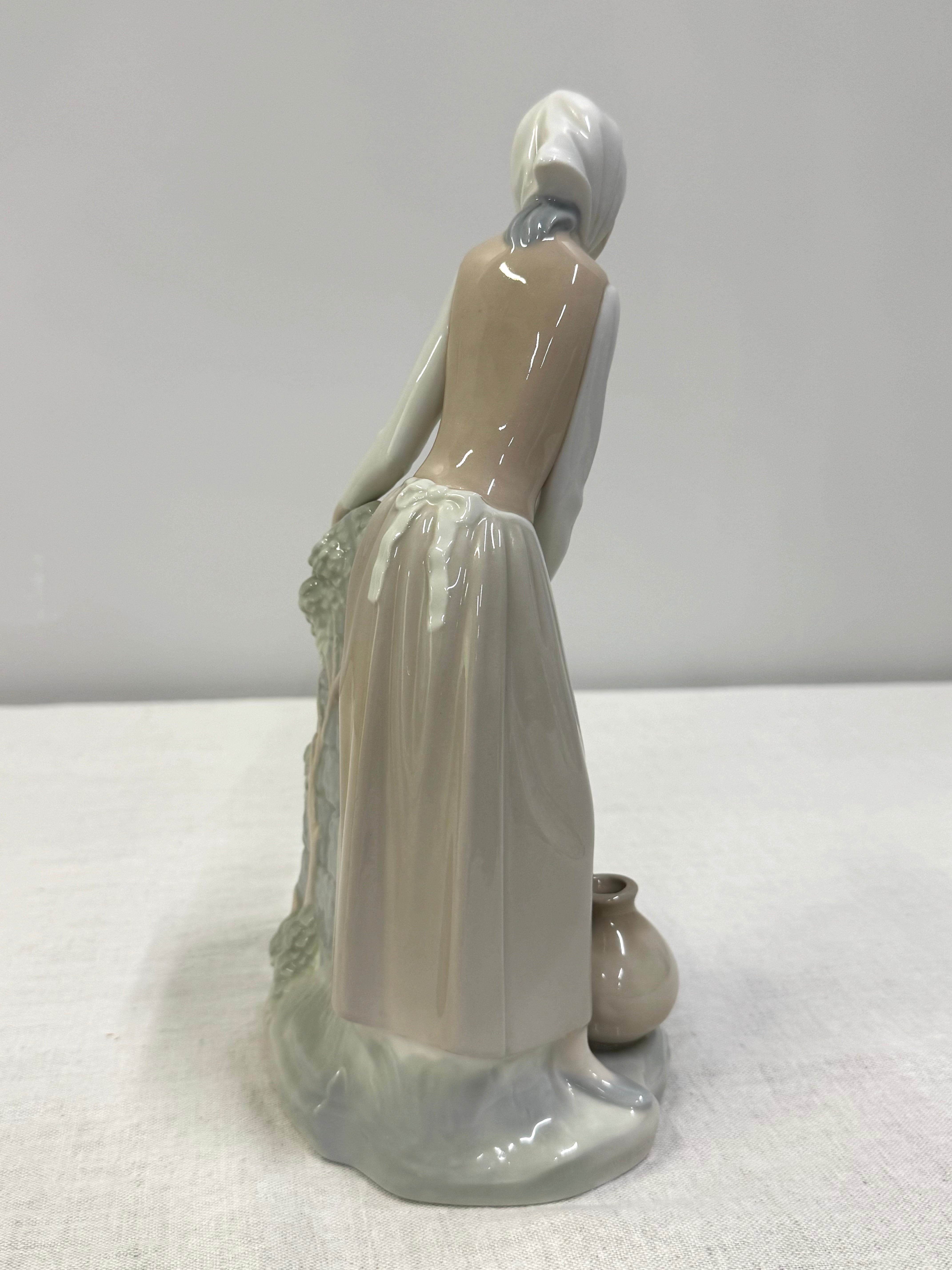 NAO by LLADRO 'Girl at the Fountain' Figurine