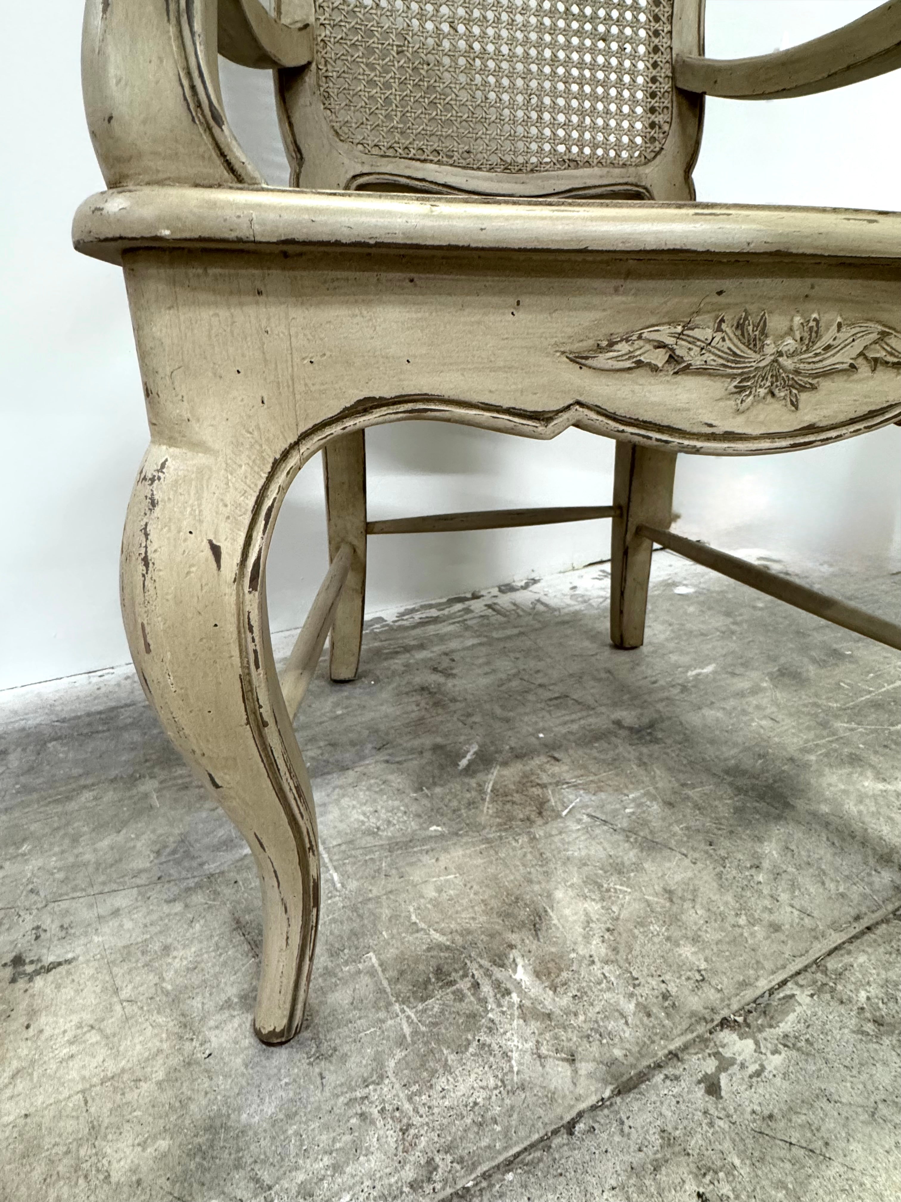 Distressed Cane Arm Chair