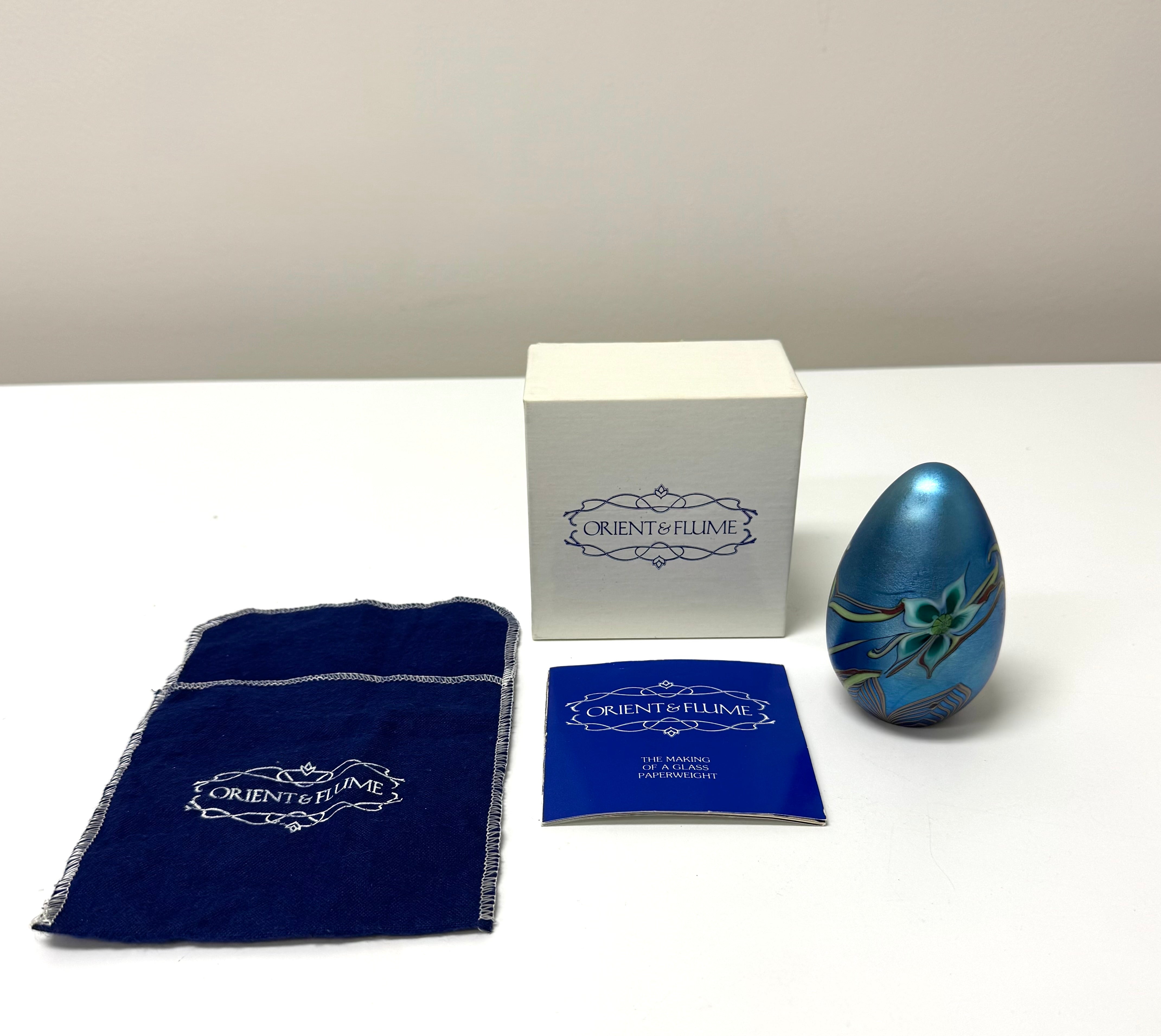 Vintage ORIENT & FLUME Iridescent Blue Egg Paperweight