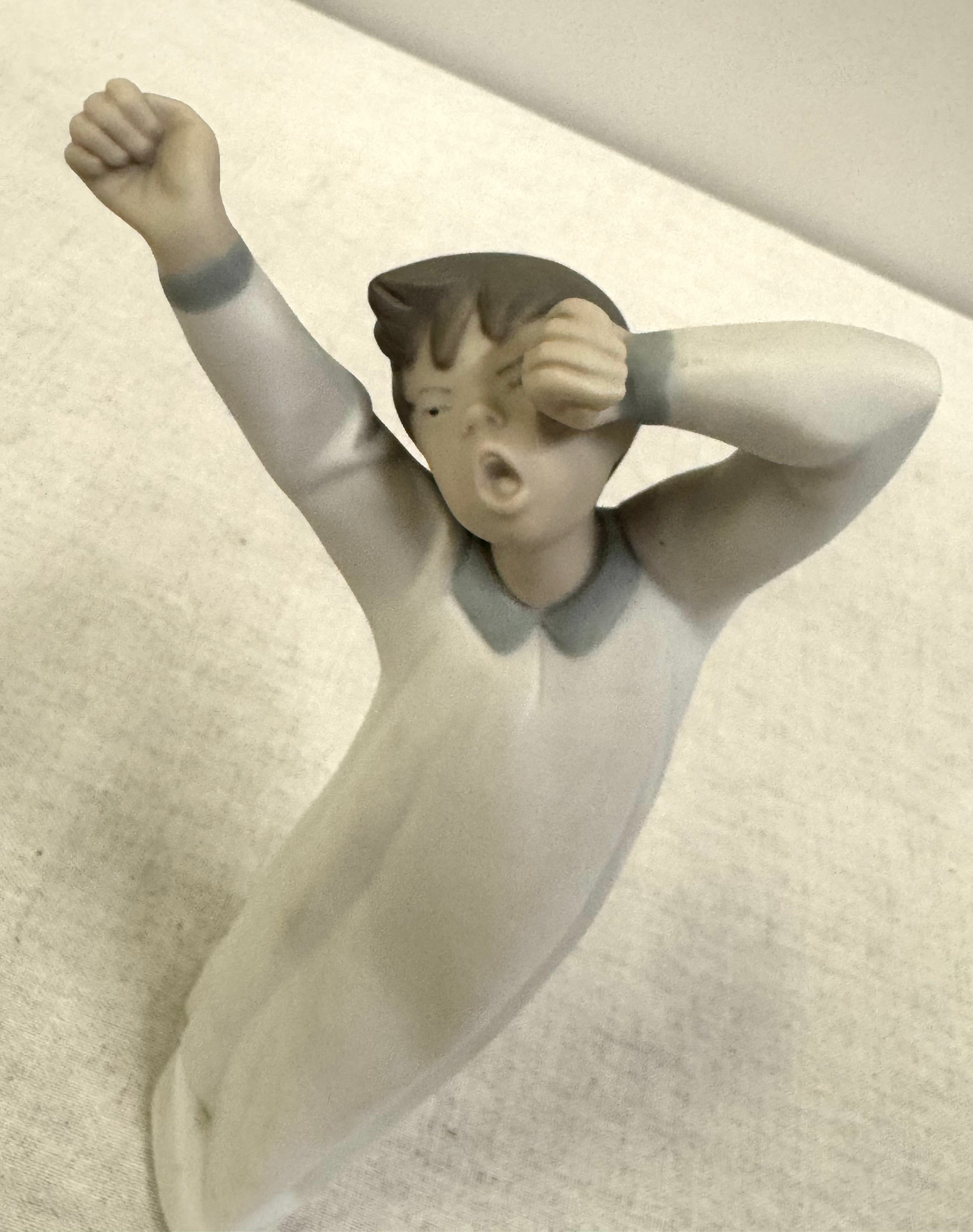 LLADRO 'Boy Yawning' Figurine