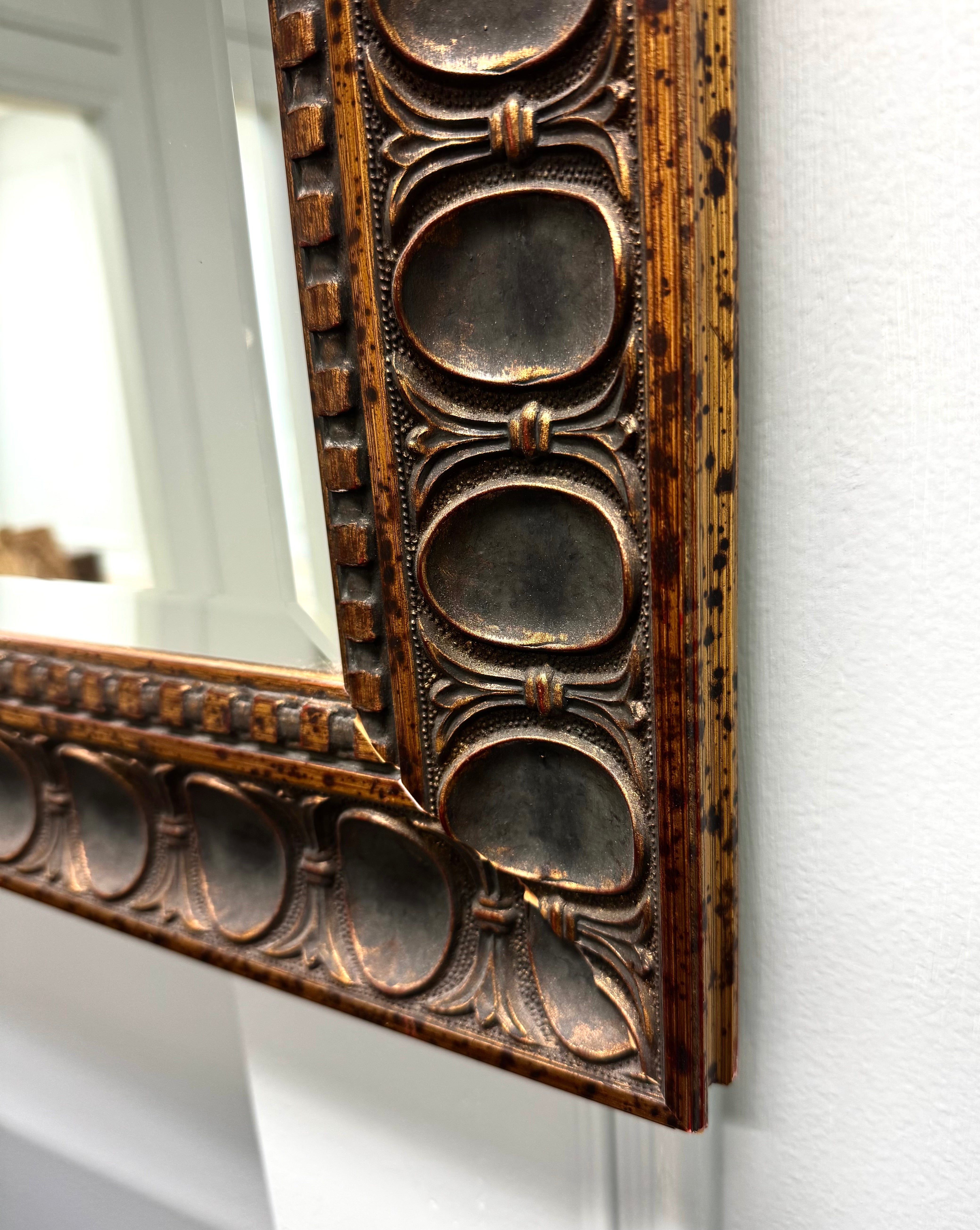 Speckled Bronze Carved Wood Mirror