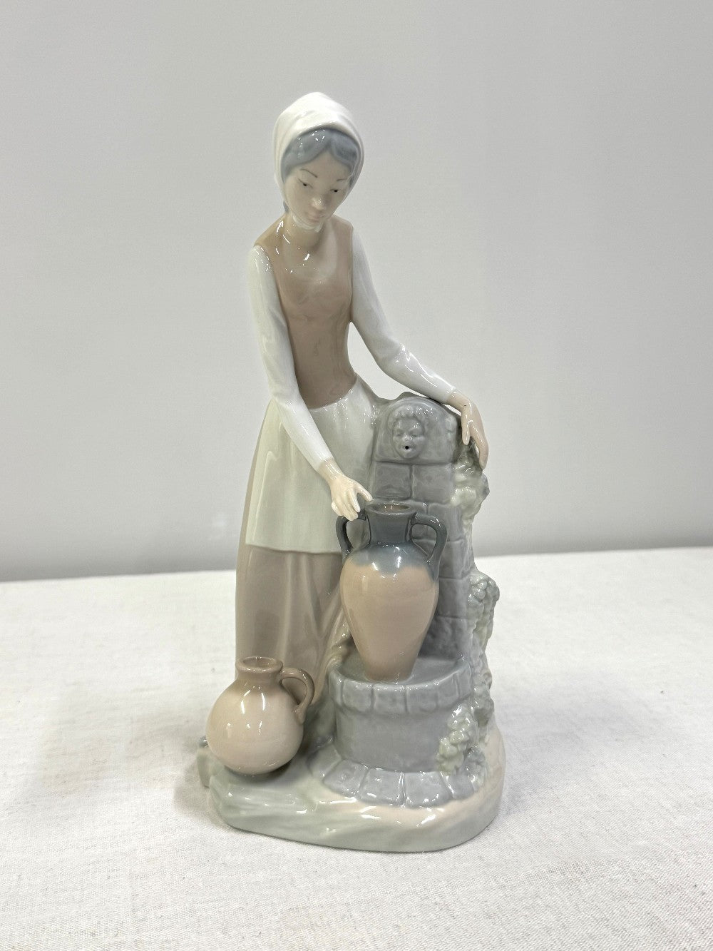NAO by LLADRO 'Girl at the Fountain' Figurine|612